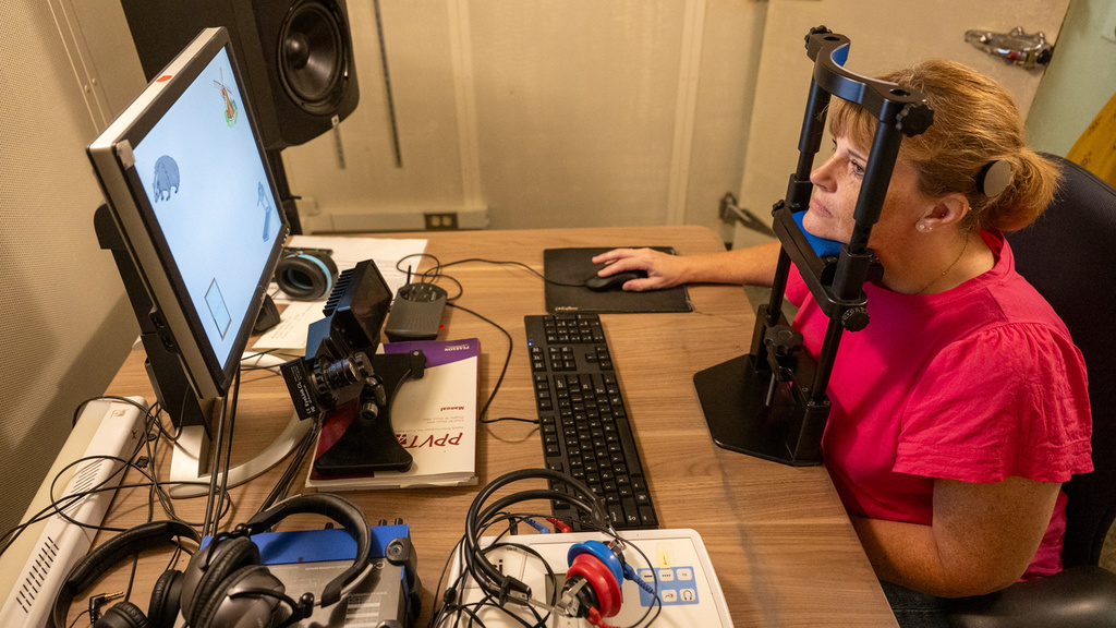 a research participant works with a computer