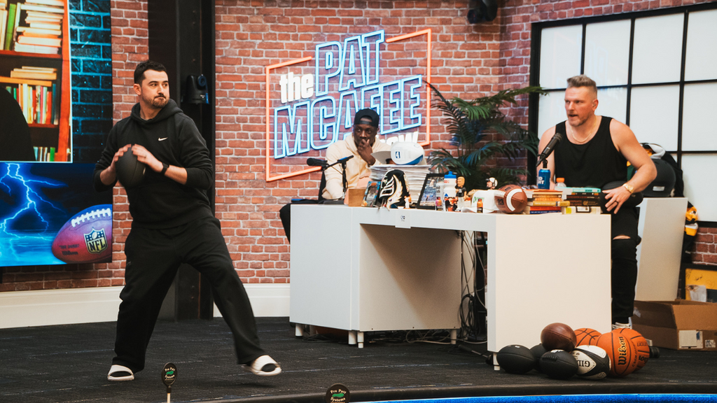 University of Iowa grad Ty Schmit, shown here with Pat McAfee (right) on the set of the former NFL player's show